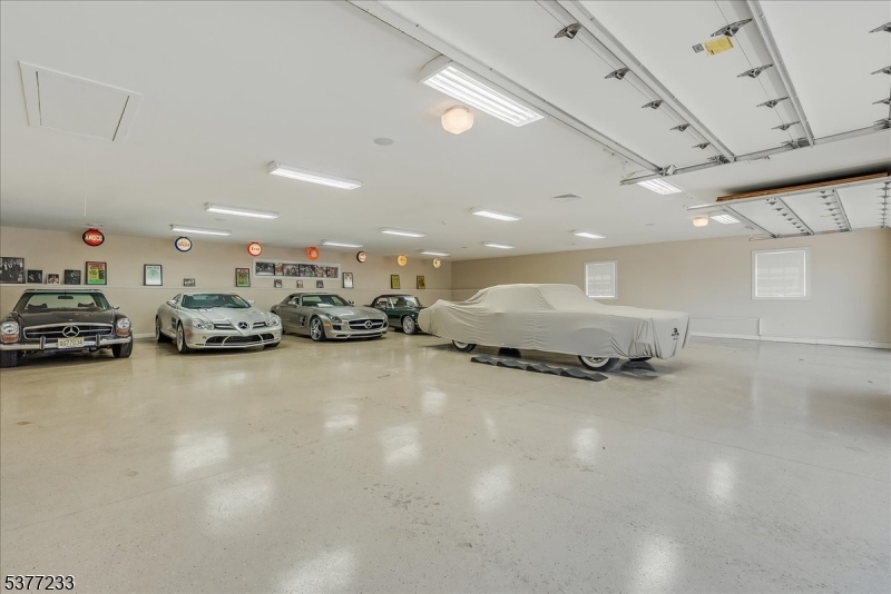 106 Mountain Top Road Glen Gardner, NJ 08826 - Photo 41 of 48 a room with lots of cars parked on the road