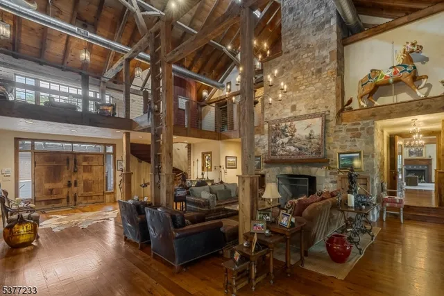 a living room with furniture or couch and a fireplace