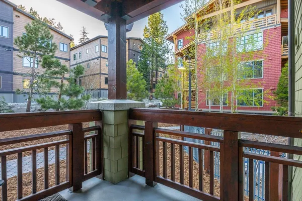 a couple of table and chair in balcony