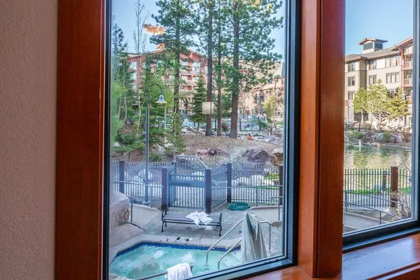 a view of a lake in middle of a city