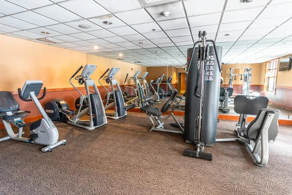 a view of swimming pool with outdoor seating and city view