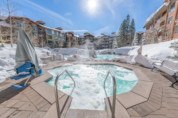 a view of a building with sitting area