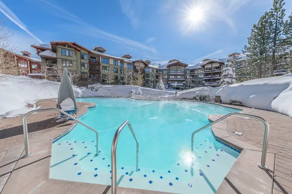 a view of a building with sitting area