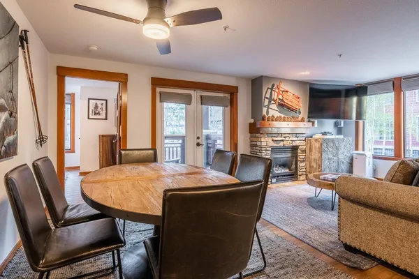 a view of a dining room with furniture window and wooden floor