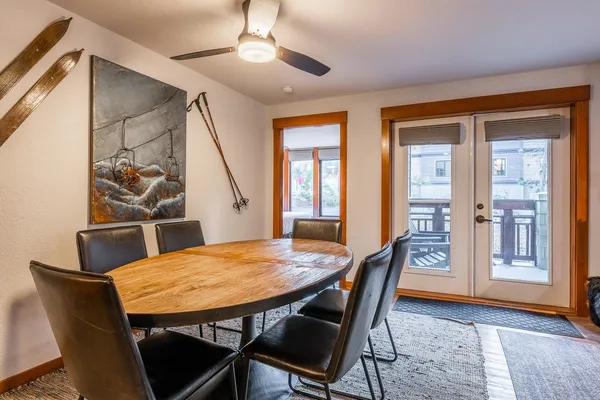 a view of a dining room and livingroom with furniture