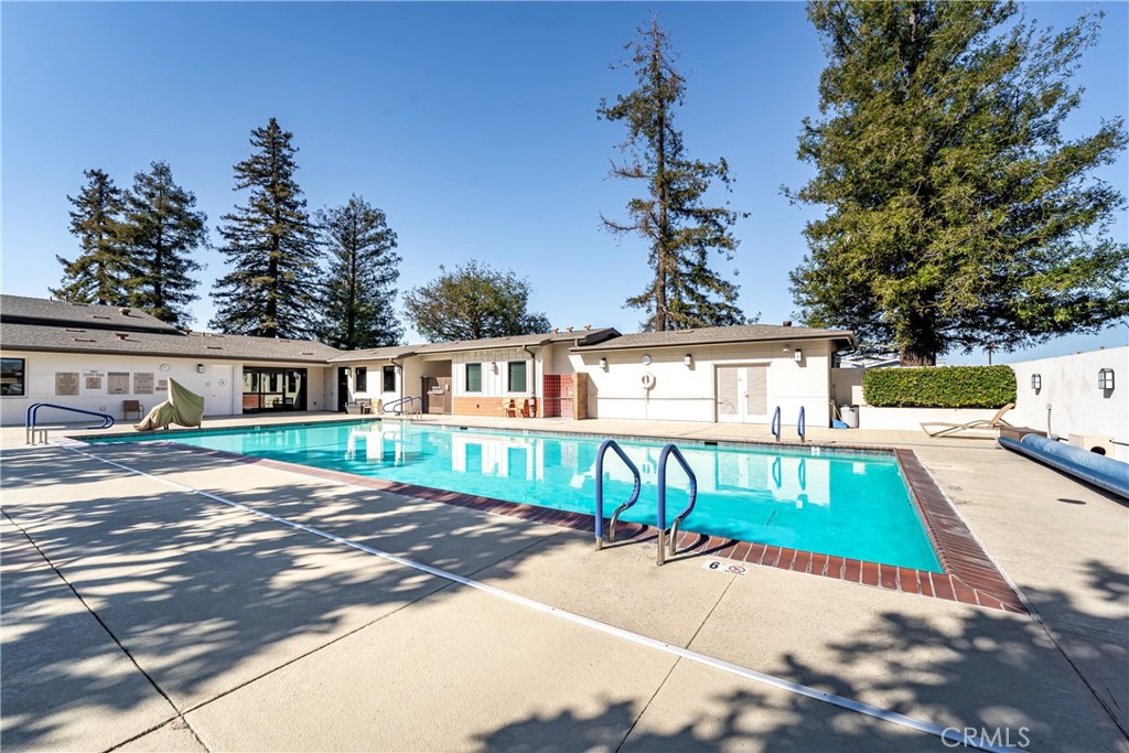 14851 Jeffrey Road, Unit 145 Irvine, CA 92618 - Photo 32 of 32 a front view of a house with garden