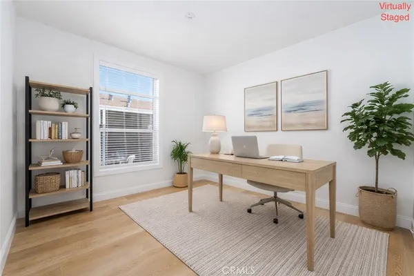 a bedroom with a bed and a cabinets