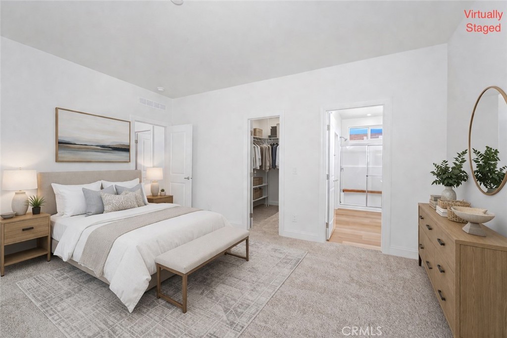 14851 Jeffrey Road, Unit 145 Irvine, CA 92618 - Photo 6 of 32 a bedroom with a bed and a cabinets