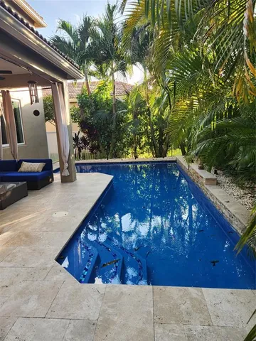 a view of a back yard of the house