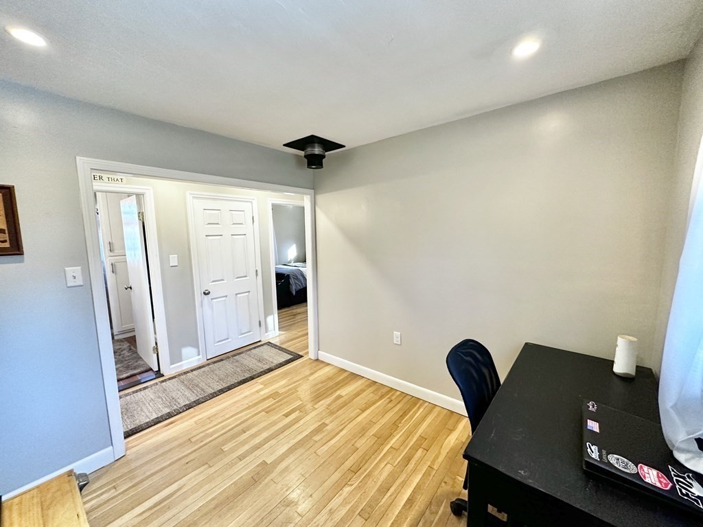 75 Coburn Road Berlin, MA 01503 - Photo 18 of 39 a view of a workspace with furniture and a window