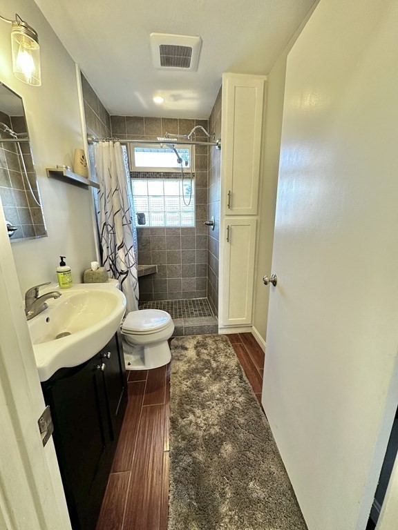 75 Coburn Road Berlin, MA 01503 - Photo 23 of 39 a bathroom with a sink and mirror