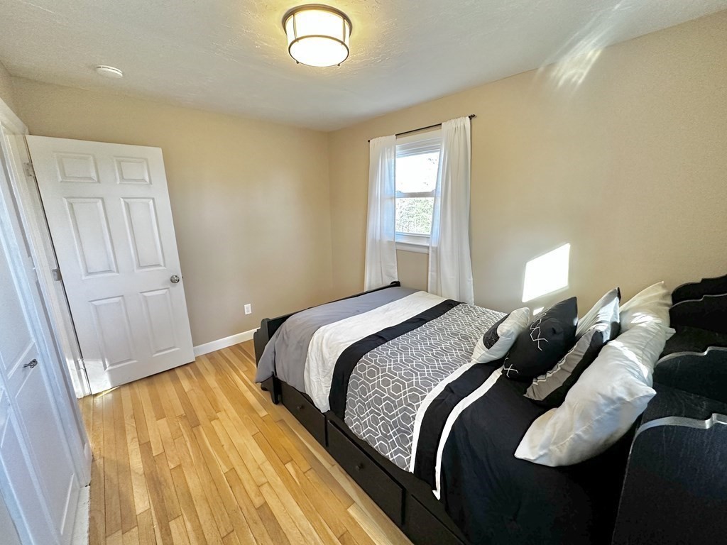 75 Coburn Road Berlin, MA 01503 - Photo 26 of 39 a bedroom with a bed and a window