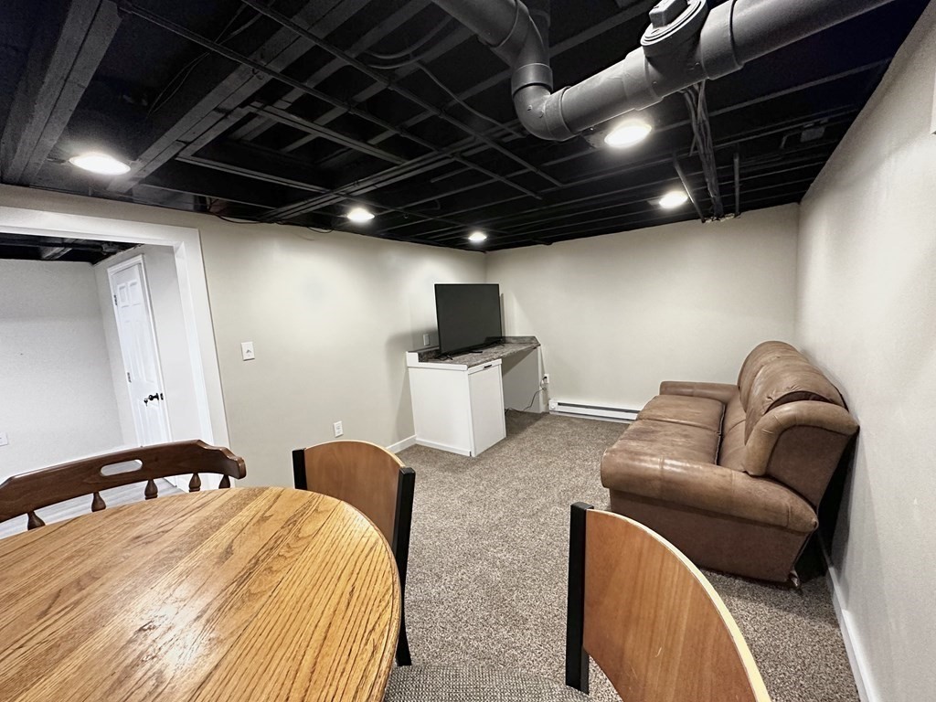 75 Coburn Road Berlin, MA 01503 - Photo 33 of 39 a bedroom with bed couch and window