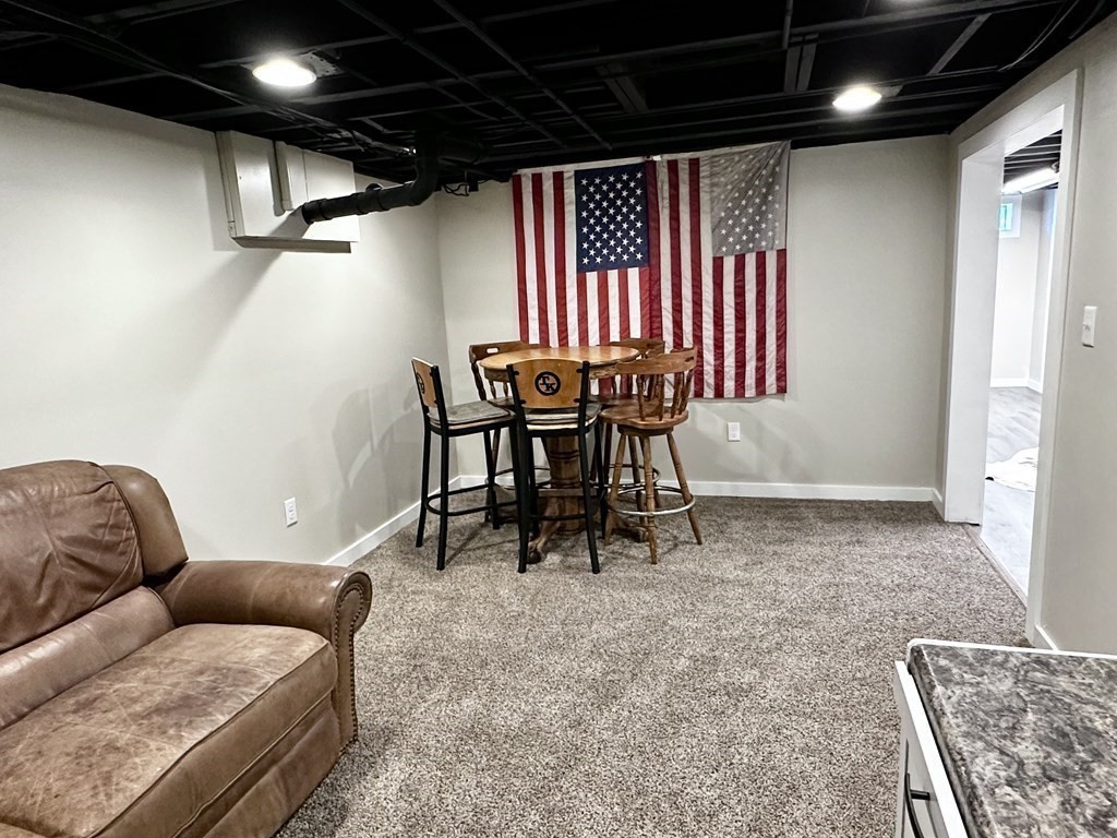75 Coburn Road Berlin, MA 01503 - Photo 34 of 39 a livingroom with furniture and a couch