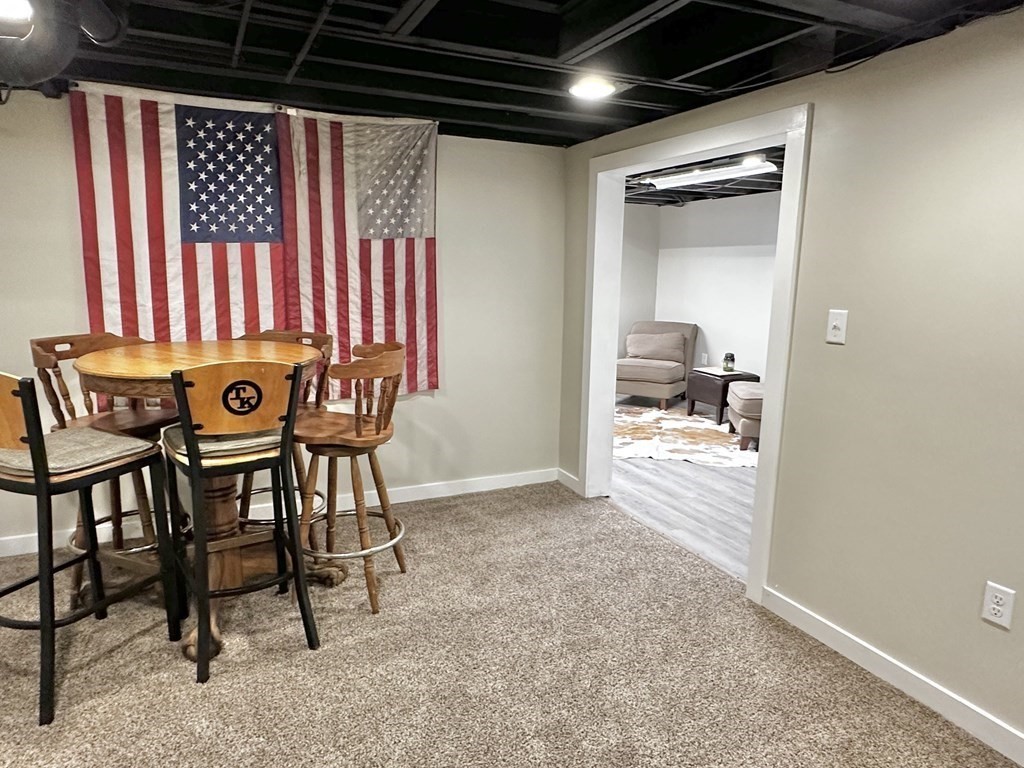 75 Coburn Road Berlin, MA 01503 - Photo 36 of 39 a view of an empty room with a table and chairs