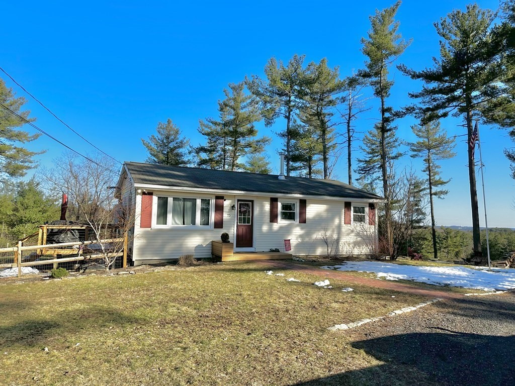75 Coburn Road Berlin, MA 01503 - Photo 38 of 39 a front view of a house with a yard