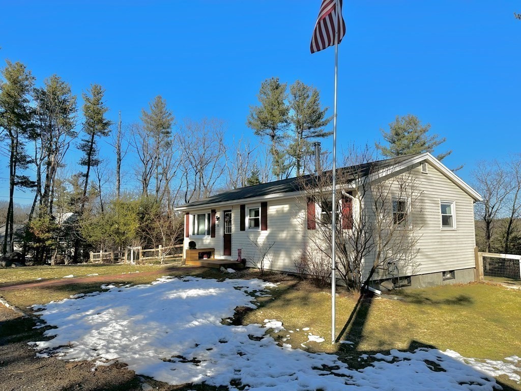 75 Coburn Road Berlin, MA 01503 - Photo 6 of 39 a view of a swimming pool with a patio