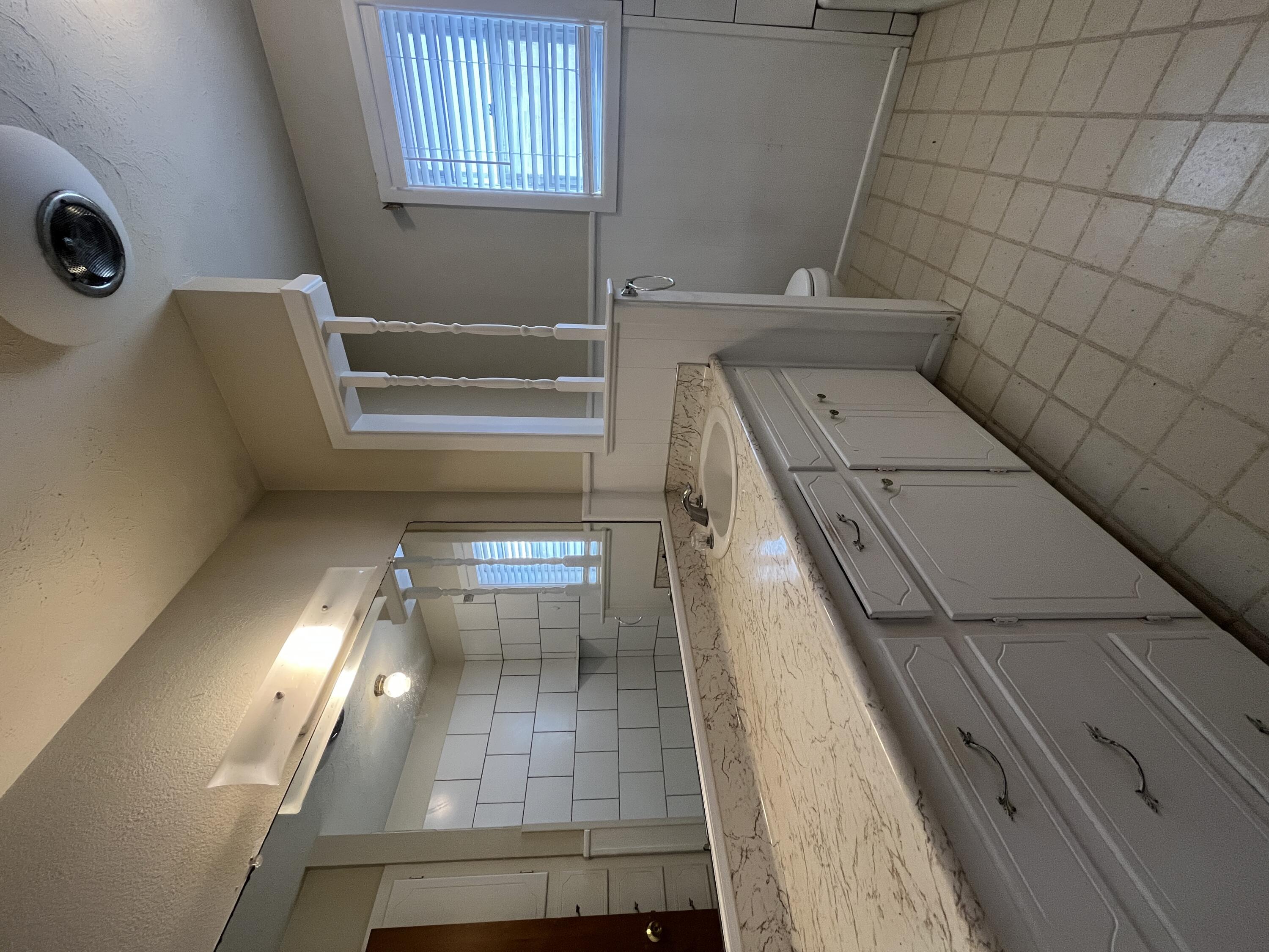 3614 56th Street Lubbock, TX 79413 - Photo 19 of 30 a bathroom with a tub