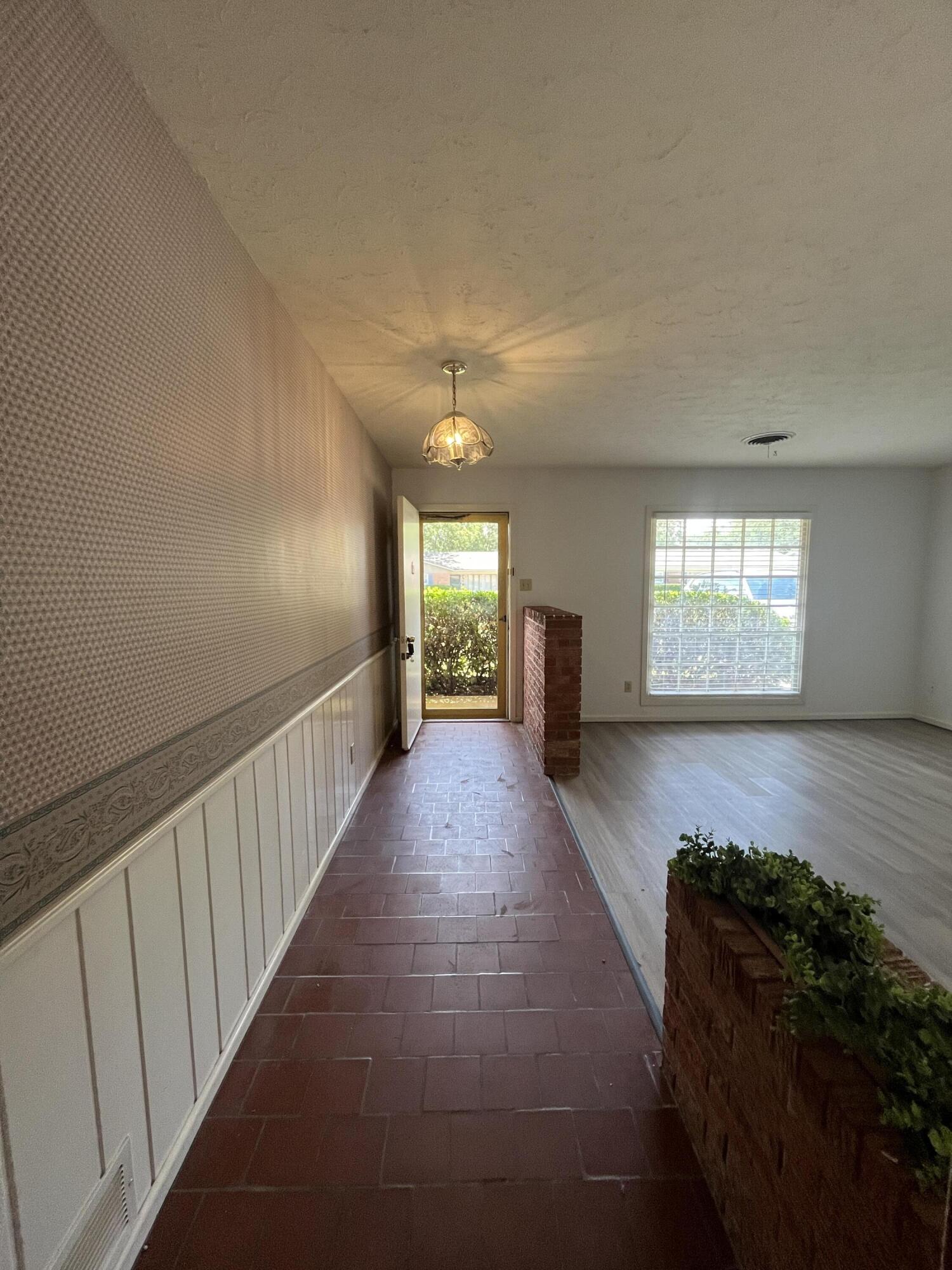 3614 56th Street Lubbock, TX 79413 - Photo 2 of 30 a view of entryway and hall with a window
