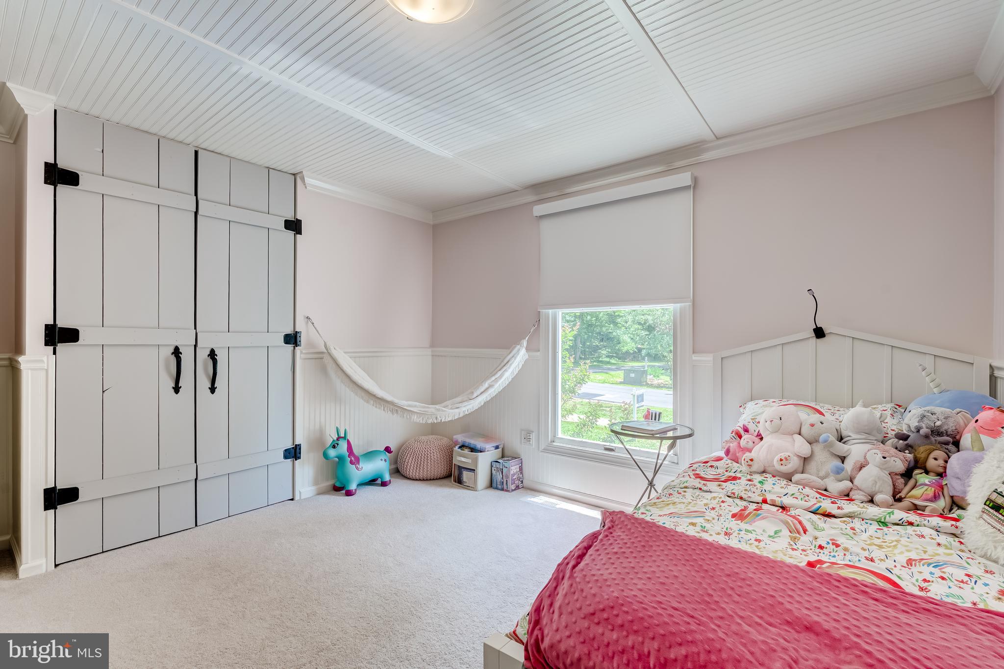 11926 Appling Valley Road Fairfax, VA 22030 - Photo 48 of 60 a bedroom with bed and a window
