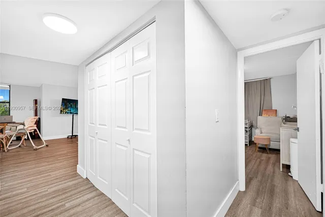 a view of a living room and dining room