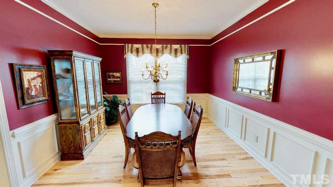 7504 Boscobel Way Raleigh, NC 27615 - Photo 6 of 25 a dining room with furniture and window