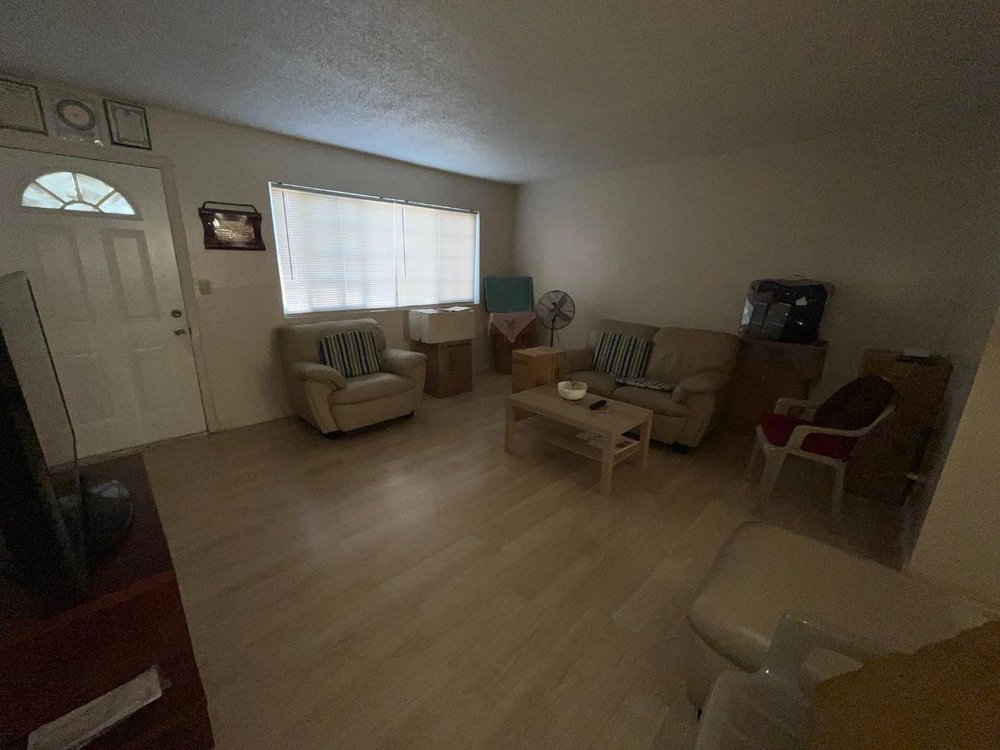 149 Adler Avenue Campbell, CA 95008 - Photo 12 of 12 a living room with furniture and a window