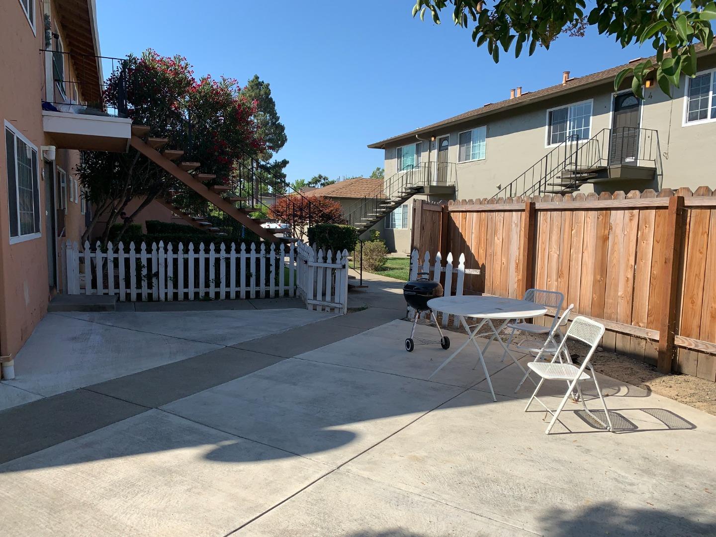 149 Adler Avenue Campbell, CA 95008 - Photo 3 of 12 a view of a patio with a table and chairs