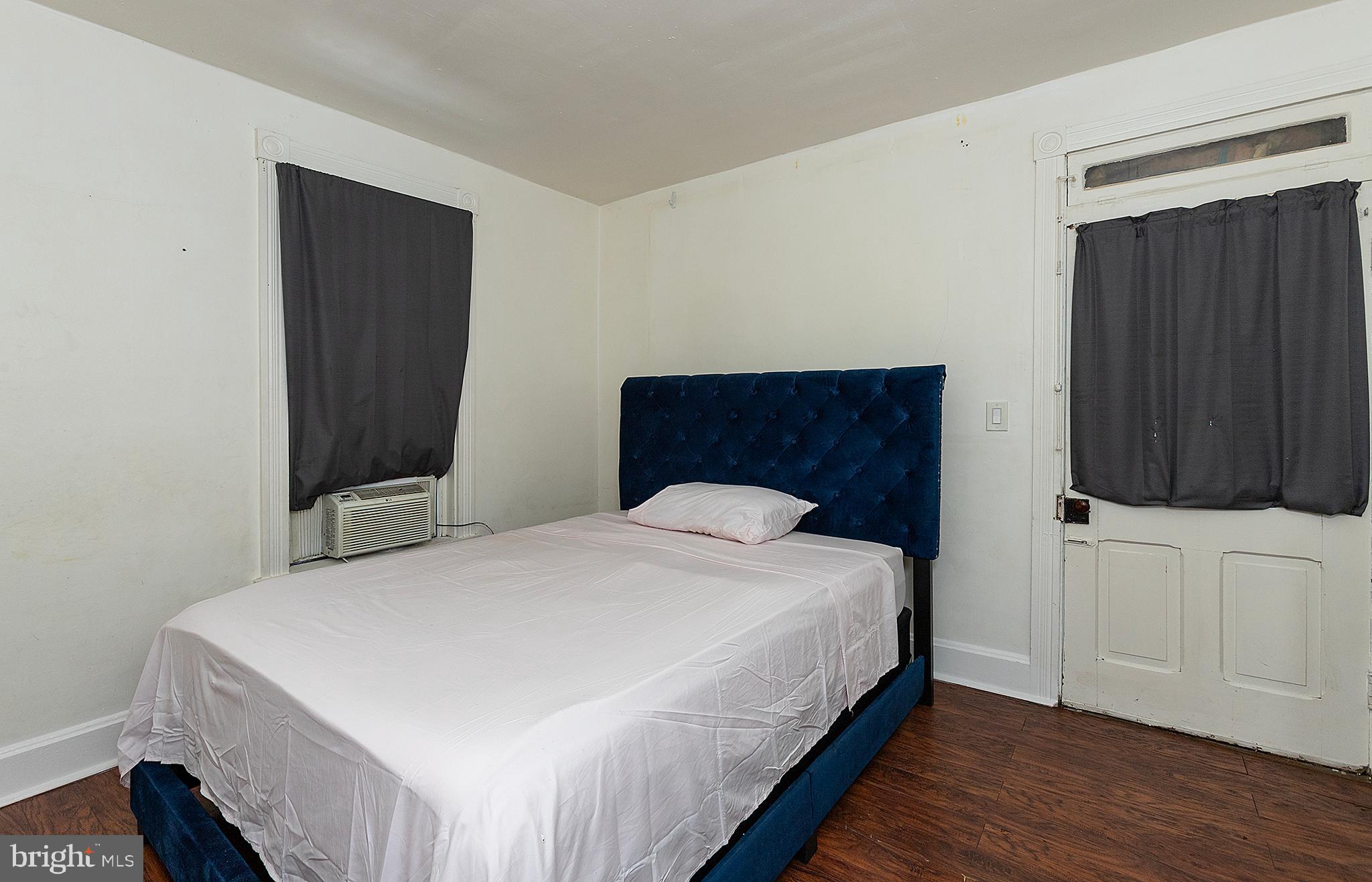 1342 State Street, Unit 2R Harrisburg, PA 17103 - Photo 12 of 17 a bedroom with a bed and a closet