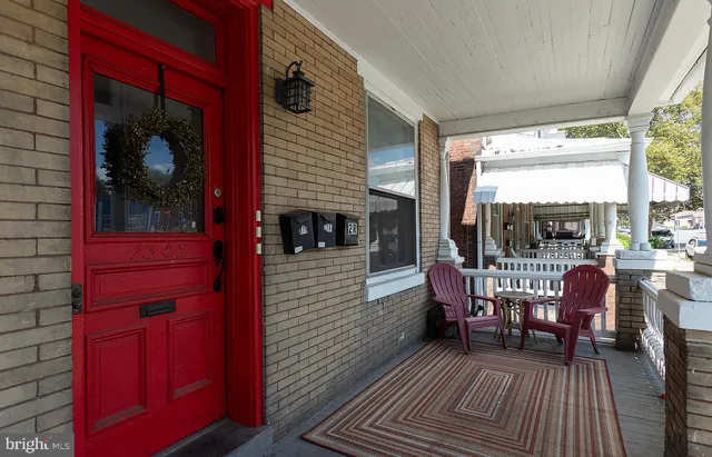 a view of a house with patio outdoor seating