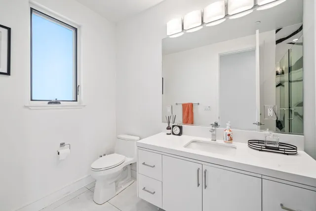 a large bathroom with a large tub and shower