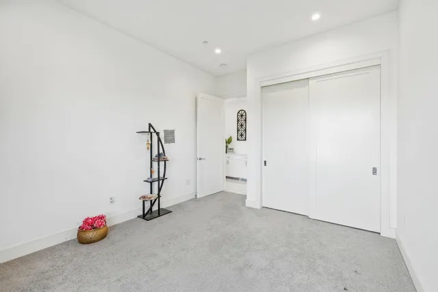 a bathroom with a large tub and shower