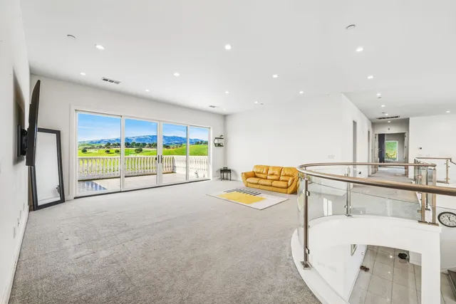 a view of a city with mountains in the background