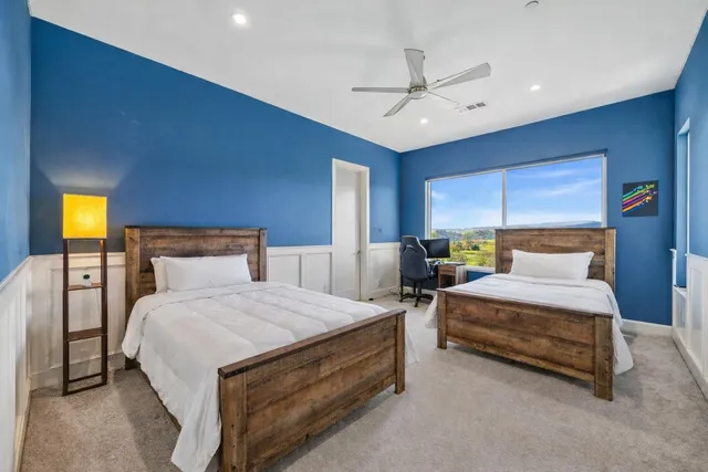 a view of a city with mountains in the background