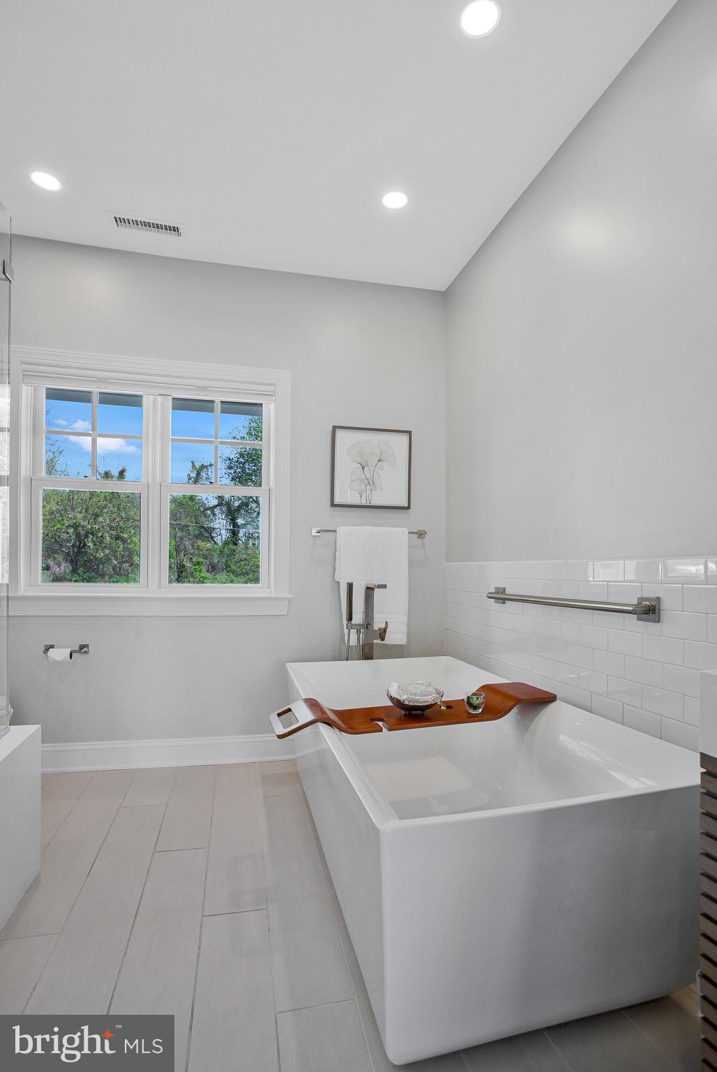 6146 Drum Point Road Deale, MD 20751 - Photo 25 of 75 a bedroom with a bed and a window