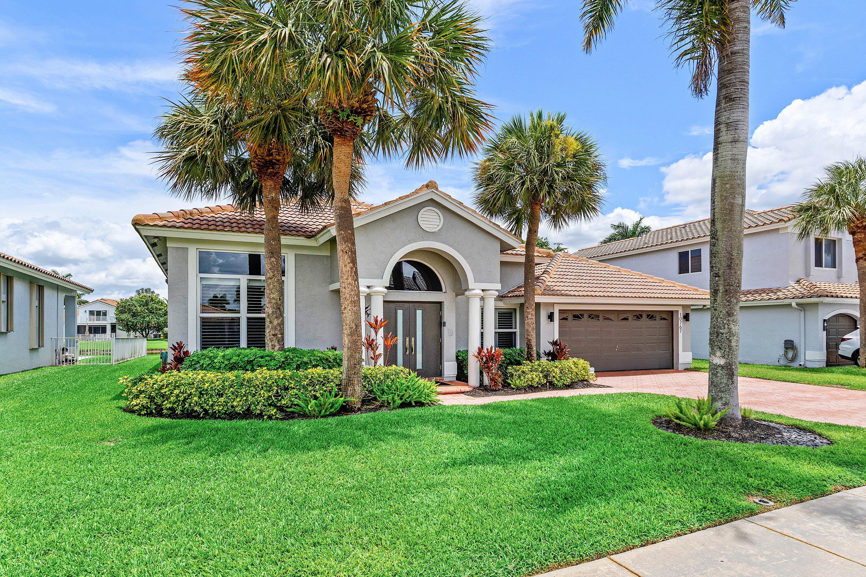 10767 Tea Olive Lane Boca Raton, FL 33498 - Photo 2 of 34 Front of home