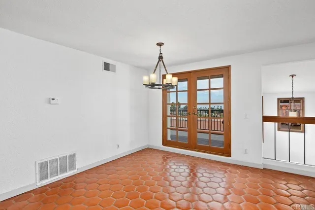 a view of empty room with windows