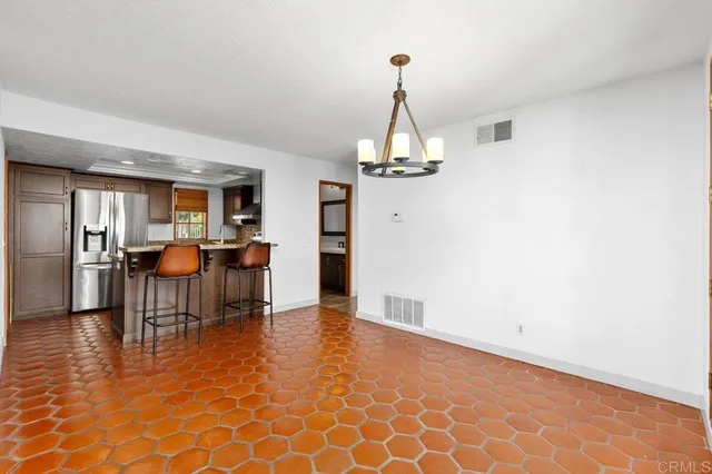 a view of a livingroom with furniture and window