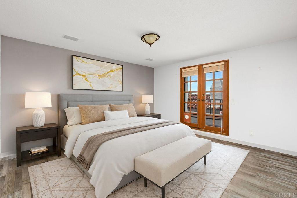 406 Paseo Pacifica Encinitas, CA 92024 - Photo 17 of 53 a spacious bedroom with a bed and a window
