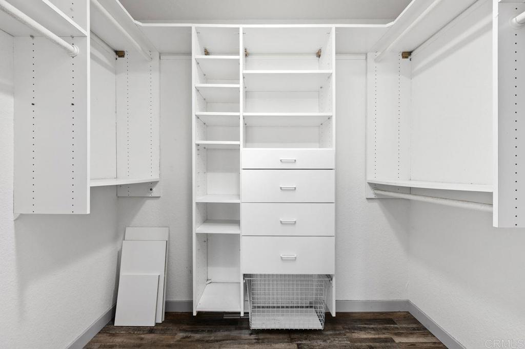 406 Paseo Pacifica Encinitas, CA 92024 - Photo 21 of 53 a view of walk in closet with empty racks