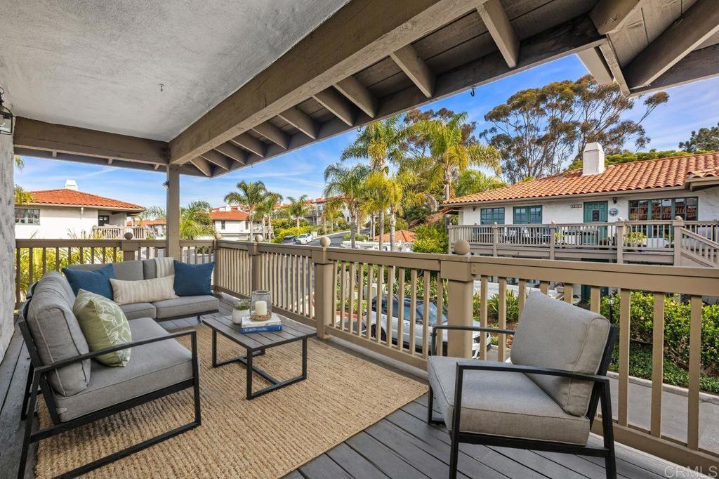 406 Paseo Pacifica Encinitas, CA 92024 - Photo 26 of 53 a roof deck with table and chairs