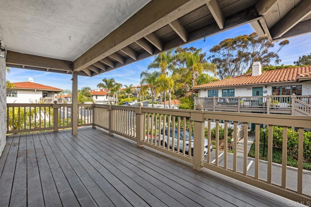 406 Paseo Pacifica Encinitas, CA 92024 - Photo 28 of 53 a view of a balcony with wooden floor