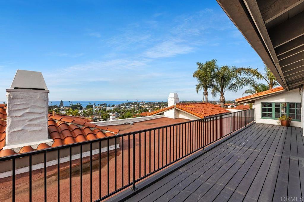 406 Paseo Pacifica Encinitas, CA 92024 - Photo 30 of 53 a balcony with wooden floor and city view