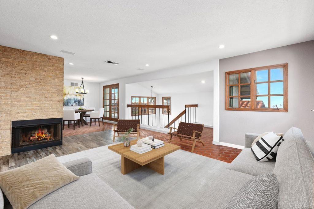 406 Paseo Pacifica Encinitas, CA 92024 - Photo 5 of 53 a living room with furniture and a fireplace