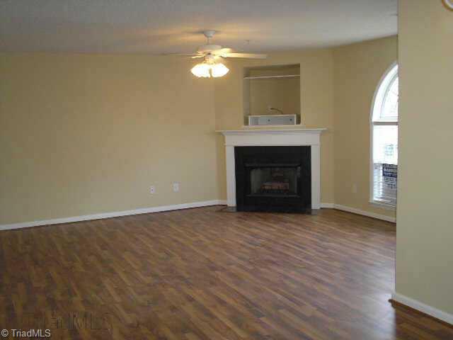 412 Timberline Ridge Court Winston-Salem, NC 27106 - Photo 3 of 9 Other. Brand new laminate flooring in the living area which offers a cosy gas log fireplace!