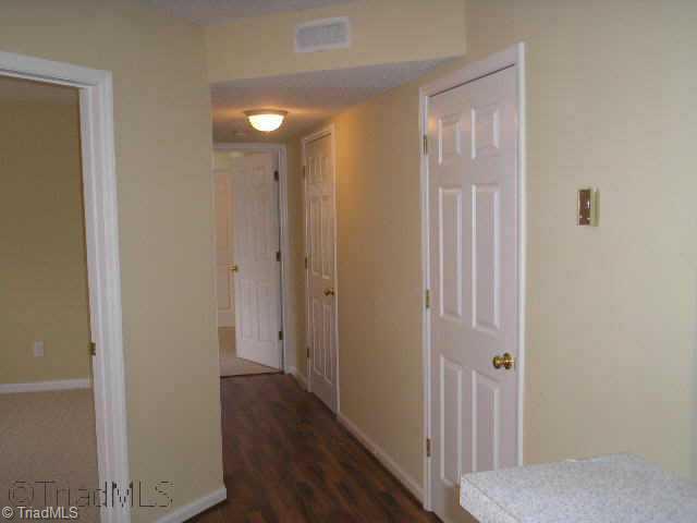 412 Timberline Ridge Court Winston-Salem, NC 27106 - Photo 6 of 9 Other. Laminate flooring in hallway leads to Master, 2nd bath and laundry room!