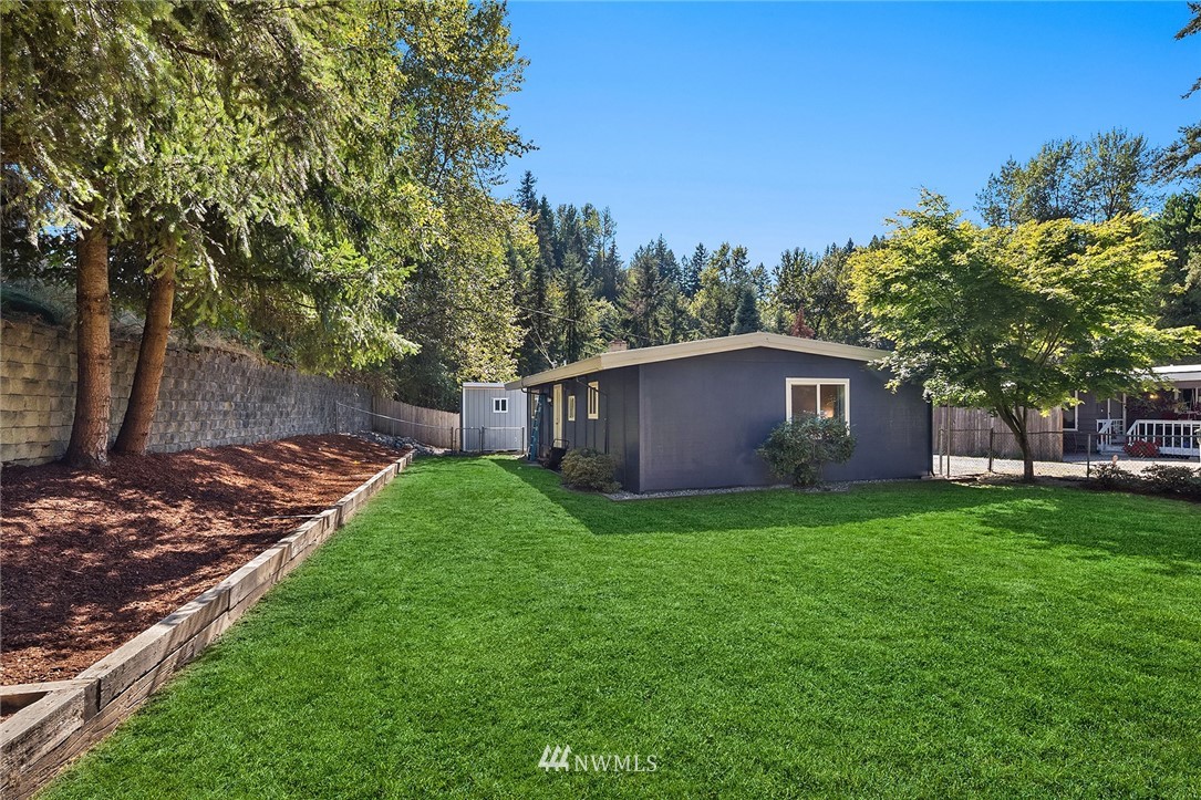 22519 Southeast Bain Road Maple Valley, WA 98038 - Photo 14 of 15 a view of a yard with a house