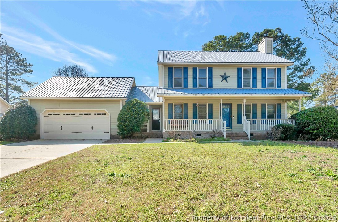 532 Blackbird Road Fayetteville, NC 28314 - Photo 1 of 38 a front view of a house with a yard