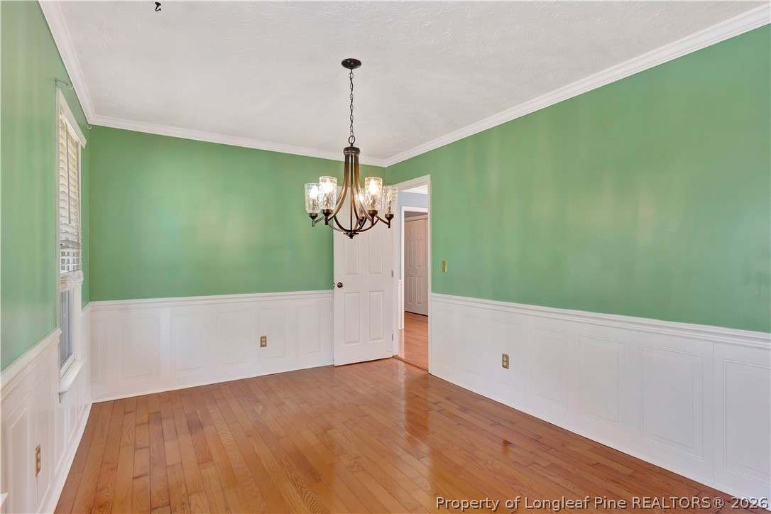 532 Blackbird Road Fayetteville, NC 28314 - Photo 16 of 38 a view of a room with a large window and chandelier