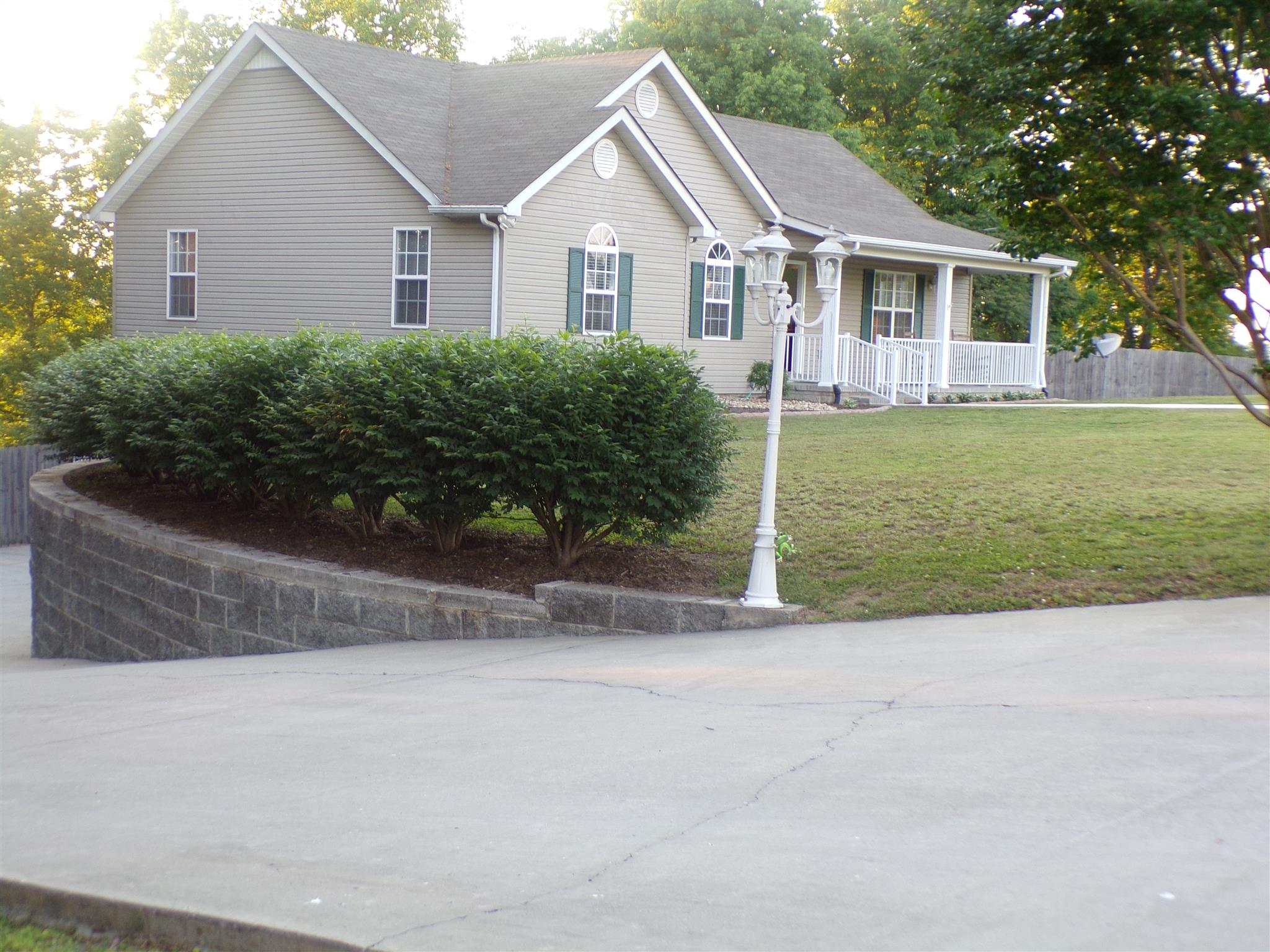 1190 Rhotons Chapel Road Manchester, TN 37355 - Photo 1 of 27 a view of outdoor space yard and front view of a house